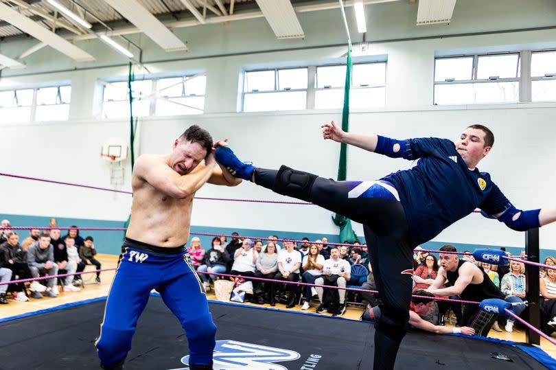 Paul hitting Thatcher Wright with a superkick -Credit:Kyle Watt