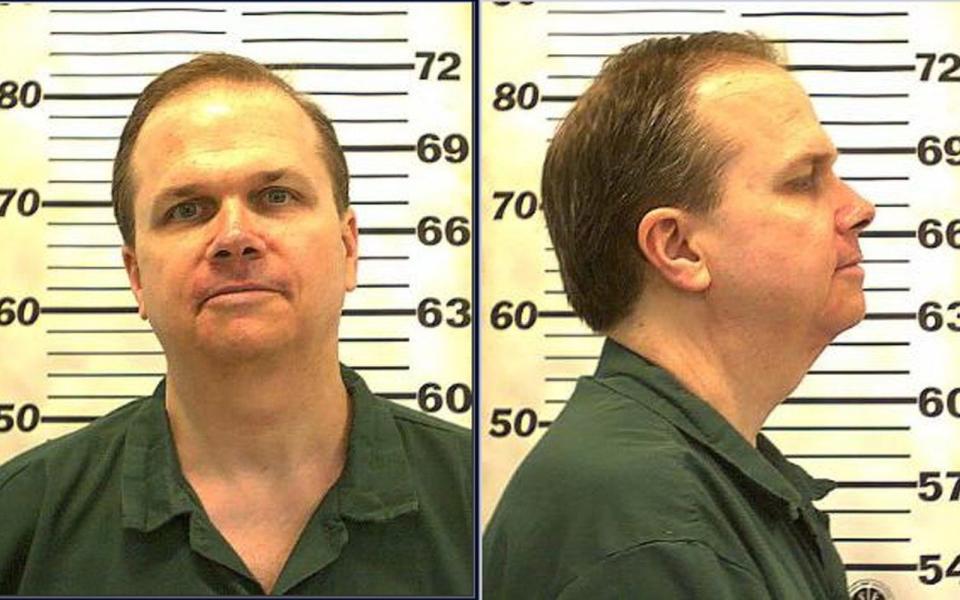 Mark Chapman was convicted of murdering Lennon outside his Manhattan apartment