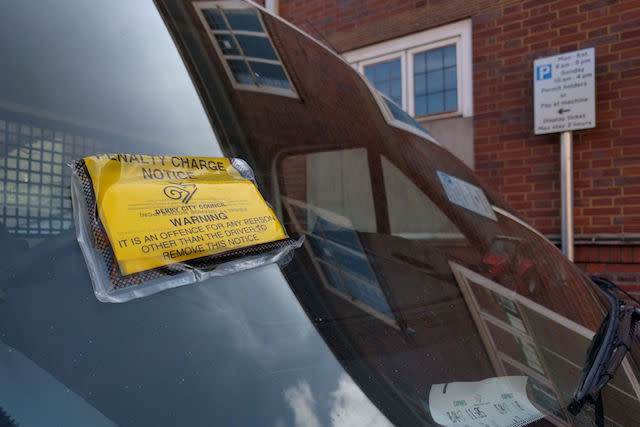 The parking ticket on the car of Charles Hirons outside Derby Crown Court where he was ordered to pay more than &pound;1,200 after spreading &quot;muck&quot; on the steps of same court.