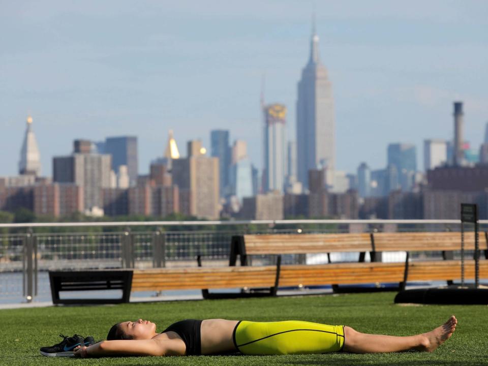 Tens of thousands of people across New York were left without power amid a heatwave that has put “severe strain” on the city’s electrical system.More than 50,000 people suffered power outages, primarily in Brooklyn and Queens, with about 40,000 still without electricity on Monday morning. Some 20,000 of those were residents of Brooklyn who were taken off power on Sunday so energy company Con Edison could make repairs to prevent a more widespread outage.The power cuts occurred just over a week after a widespread blackout in midtown Manhattan and part of the Upper West Side that left approximately 72,000 people without electricity and disrupted subway services."We have been through this situation with Con Ed time and again, and they should have been better prepared – period," Governor Andrew Cuomo said in a statement.He added: "This was not a natural disaster; there is no excuse for what has happened in Brooklyn."Mr Cuomo said he deployed 200 state troopers, 100 generators and 50 light towers to Brooklyn to help with the outages and urged New Yorkers to check on their neighbours, especially the elderly.The governor has also directed the Department of Public Service to investigate Con Edison and the cause of the outages.A press release by Con Edison said the outages were caused by “continued heat and high usage”.New York's mayor, Bill de Blasio, said he was told by the company’s president that parts of the system in Brooklyn had come “under severe strain and some equipment [had] failed”.Temperatures in New York reached highs of 35C on Saturday and Sunday following weeks of hot weather, with temperatures peaking in the low 30s.The blackout earlier in the month was caused by equipment failure, not heat, affecting a 40-block stretch of Manhattan, including Times Square and the Rockefeller Centre.“It's still hot and people have a right to be frustrated,” Mr de Blasio tweeted late on Sunday. “We're pushing Con Ed to get power back as fast as possible.”New York's heatwave is expected to cool slightly over the coming days, reducing the strain on the power grid.Agencies contributed to this report