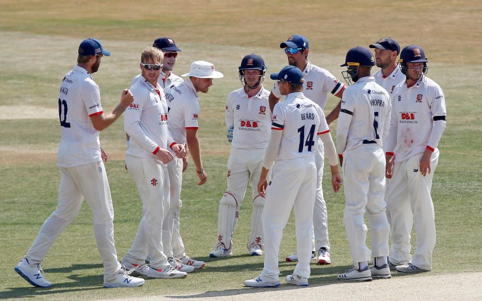 Simon Harmer of Essex (second left) is congratulated on taking the wicket of Will Jacks during day four of the Bob Willis Trophy  - Getty Images