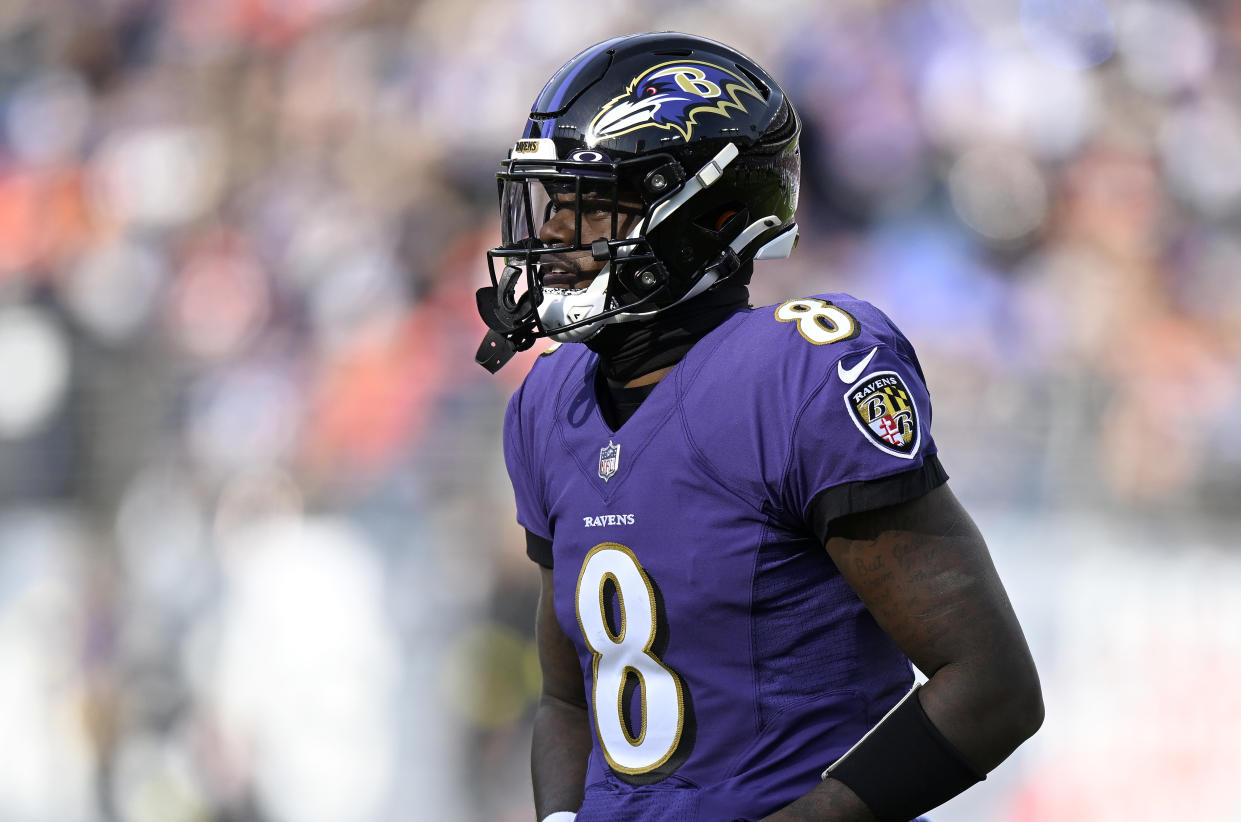 BALTIMORE, MARYLAND - DECEMBER 04: Lamar Jackson #8 of the Baltimore Ravens walks across the field during the game against the Denver Broncos at M&T Bank Stadium on December 04, 2022 in Baltimore, Maryland. (Photo by G Fiume/Getty Images)