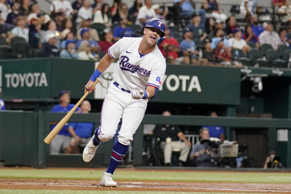 Texas Rangers' Josh Jung yells out after flying out to left in the first inning of a baseball game against the Boston Red Sox in Arlington, Texas, Monday, Sept. 18, 2023. (AP Photo/Tony Gutierrez)