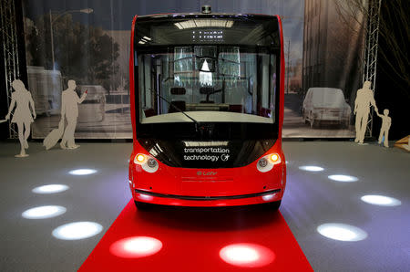 FILE PHOTO: The new i-Cristal electric autonomous shuttle is presented at the Lohr Group headquarters factory in Duppigheim near Strasbourg, France, September 10, 2018. REUTERS/Vincent Kessler/File Photo