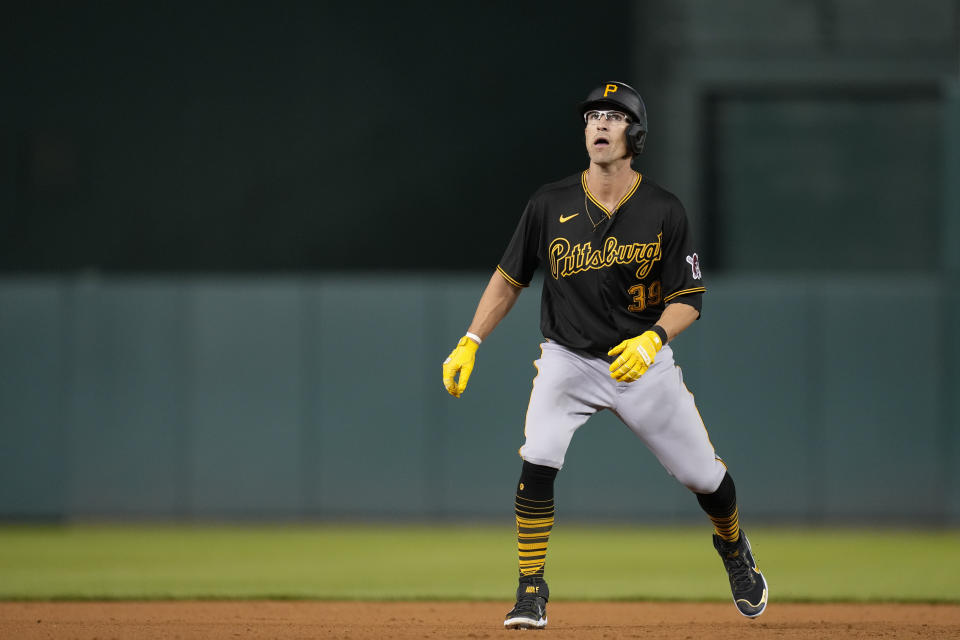 Pittsburgh Pirates' Drew Maggi watches teammate Miguel Andujar's three run home run sail overhead as he takes a lead from second base in the ninth inning of the second baseball game of a doubleheader against the Washington Nationals, Saturday, April 29, 2023, in Washington. (AP Photo/Patrick Semansky)