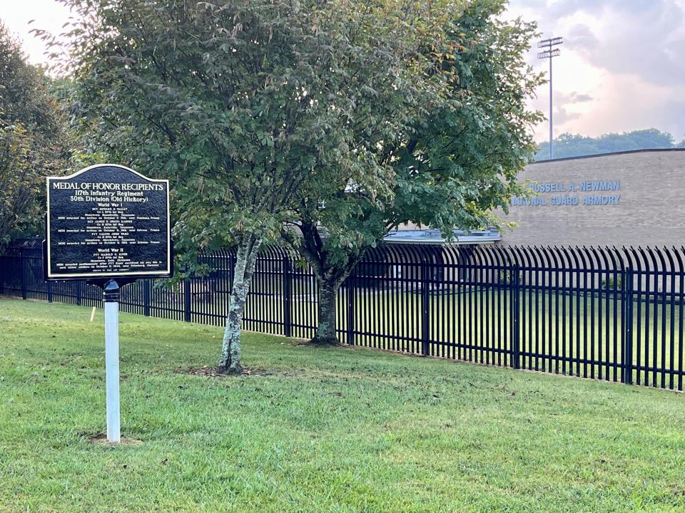 The National Guard Armory on Sutherland Avenue in Knoxville, Tennessee, Sept. 2023. In front is a sign honoring 4 Medal of Honor recipients who were in the Tennessee-affiliated 117th Infantry Regiment, 30th Division.