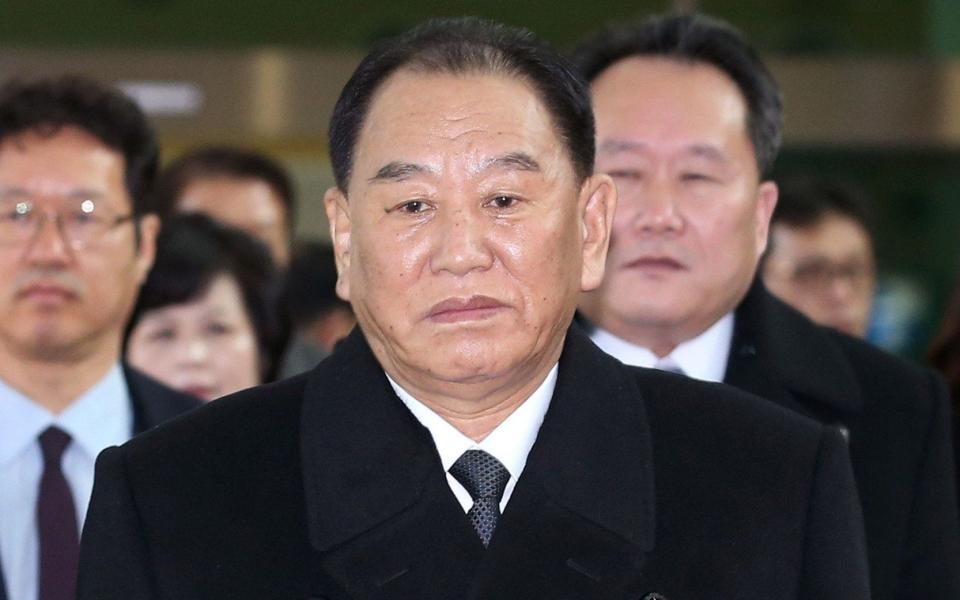 Kim Yong-chol (centre), who leads a North Korean high-level delegation to attend the Pyeongchang 2018 Winter Olympic Games closing ceremony - AFP