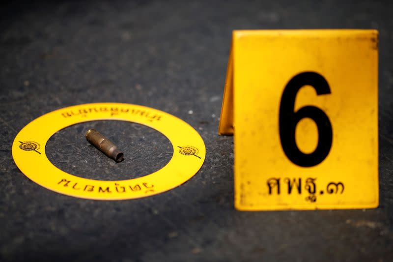 A bullet shell is seen in front of the Terminal 21 shopping mall following a gun battle involving a Thai soldier on a shooting rampage, in Nakhon Ratchasima