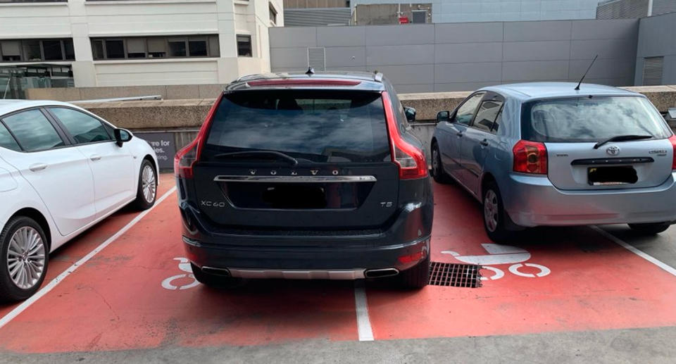 A Sydney dad has shamed a driver for taking up two shopping centre parking spots designated for parents. Source: slurpycow112/Reddit