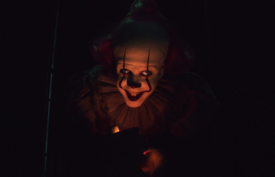 This image released by Warner Bros. Pictures shows Bill Skarsgard as Pennywise in New Line Cinema’s horror thriller "It: Chapter 2." (Warner Bros. Pictures via AP)