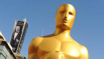 The Oscar statue looms on the red carpet ahead of the 85th Academy Awards. (Credit: PA)