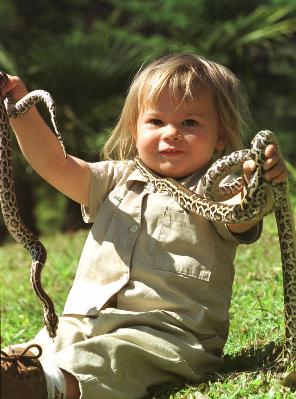 SUNSHINE COAST, AUSTRALIA - AUGUST 22: (EUROPE AND AUSTRALASIA OUT) Bindi Irwin, 2, daughter of Steve Irwin, with with Burmese Pythons. (Photo by Graeme Parkes/Newspix/Getty Images)