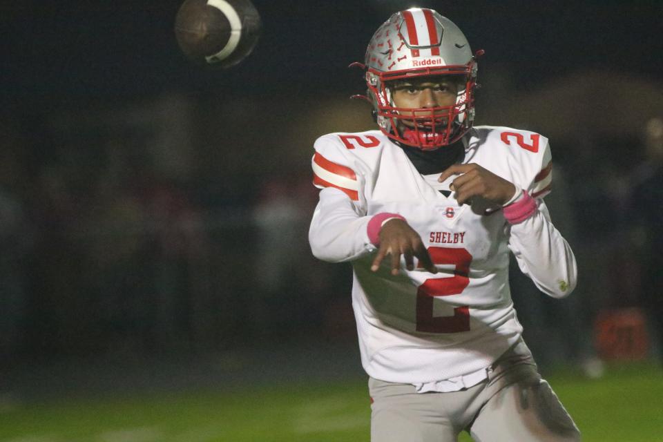 Shelby quarterback Brayden DeVito completes a pass during the Whippets' 37-31 win over Ontario on Friday night putting the Whippets in a tie for first place in the MOAC.