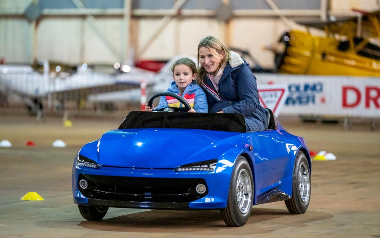 Vicky Parrott with her six year old daughter Florence at the wheel of the Firefly - Andrew Crowley