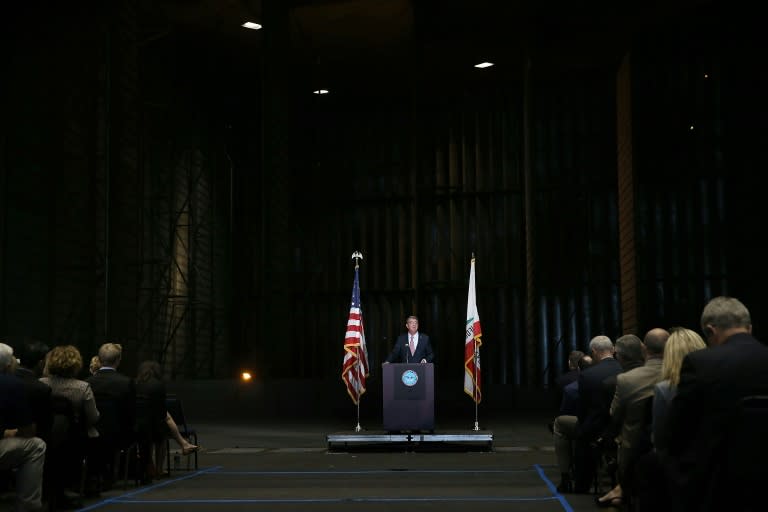 US Secretary of Defense Ashton Carter speaks inside of the Unitary Plan Wind Tunnel at the NASA Ames Research Center on August 28, 2015 in Mountain View