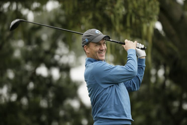 Peyton Manning golfing at Pebble Beach in February. (AP)