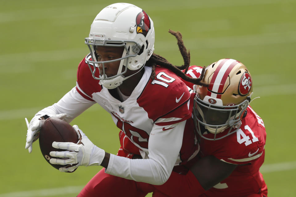 Arizona Cardinals wide receiver DeAndre Hopkins (10) catches a pass against San Francisco 49ers cornerback Emmanuel Moseley (41) during the first half of an NFL football game in Santa Clara, Calif., Sunday, Sept. 13, 2020. (AP Photo/Josie Lepe)