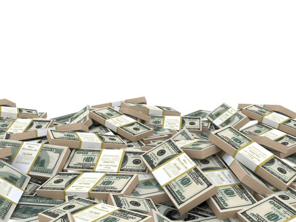 Straps of U.S. hundred-dollar bills in a pile.