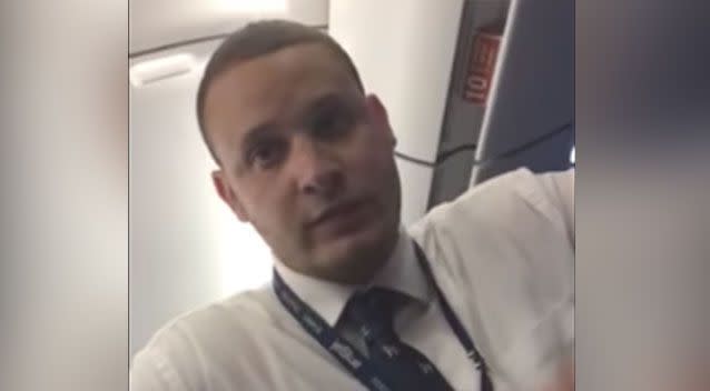 The airline staff member did not specify a reason in the video, only offering to refund the family's tickets. Picture: YouTube/Charles Jones