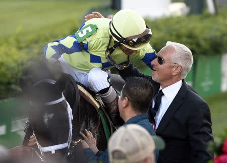 FILE PHOTO - May 6, 2017; Louisville , KY, USA; John Velazquez aboard Always Dreaming (5) celebrates with trainer Todd Pletcher after winning the 2017 Kentucky Derby at Churchill Downs. Mandatory Credit: Jamie Rhodes-USA TODAY Sports