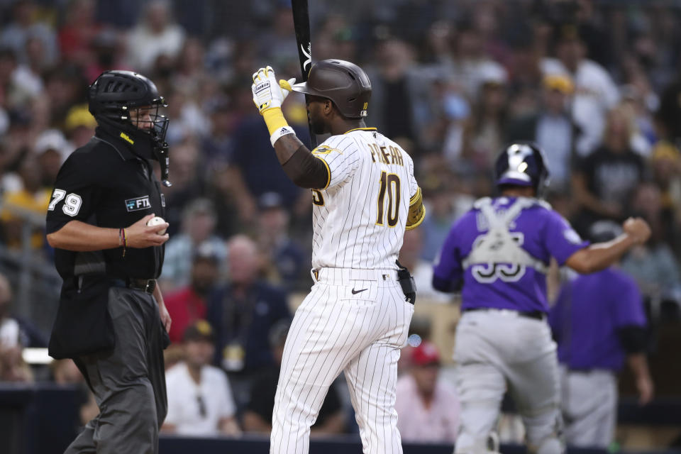 San Diego Padres' Jurickson Profar reacts after being called out on strikes with the bases loaded to end the sixth inning of the team's baseball game against the Colorado Rockies on Saturday, July 31, 2021, in San Diego. (AP Photo/Derrick Tuskan)