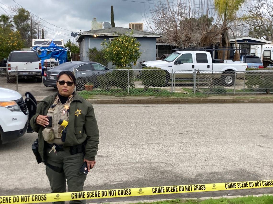 Tulare County Sheriff’s deputies continued to investigate the home Tuesday, Jan. 17, 2023, where six people were killed the previous day in a potential drug cartel massacre. LEWIS GRISWOLD/Special to The Bee