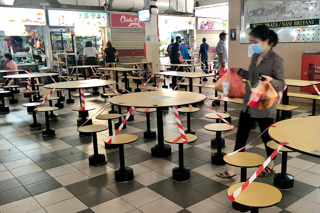 Cordoned off seats seen at the Empress Market and Food Centre on 16 April 2020, Day 10 of Singapore's partial lockdown. (PHOTO: Dhany Osman / Yahoo News Singapore)