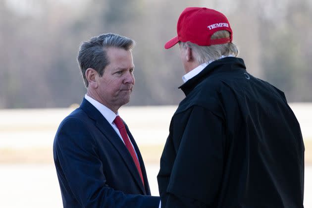 Gov. Brian Kemp, R-Ga., greets President Donald Trump as he steps off Air Force One during arrival, Friday, March 6, 2020, at Dobbins Air Reserve Base in Marietta, Ga. (AP Photo/Alex Brandon)