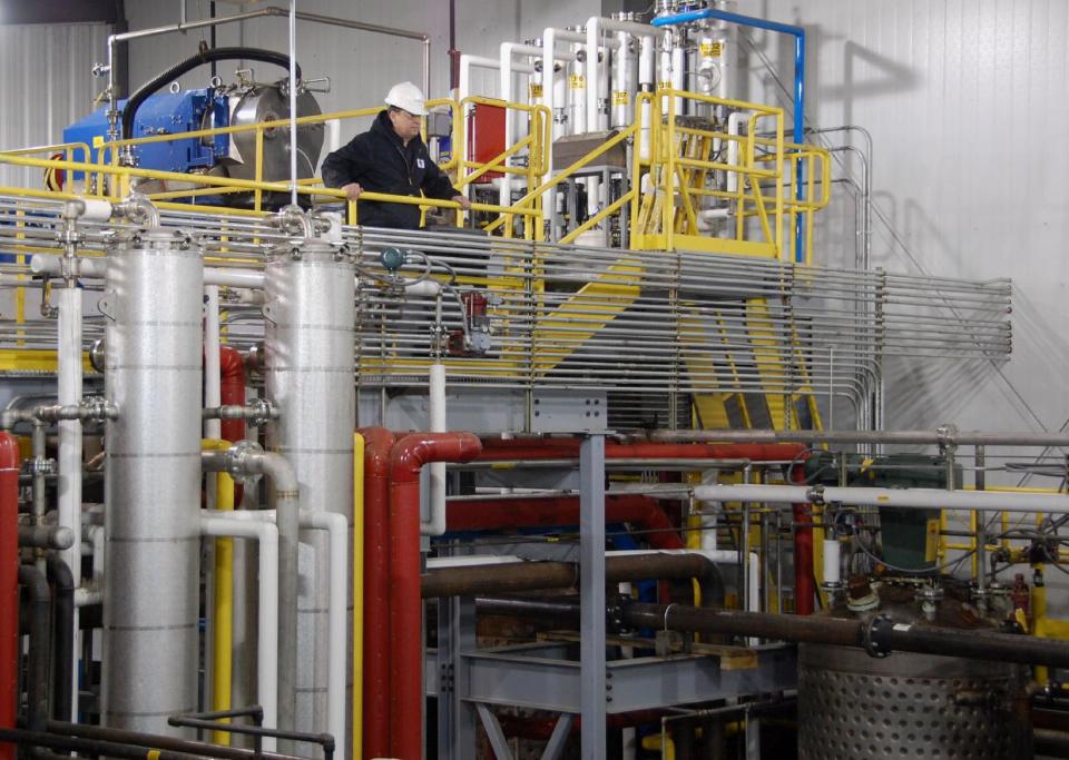 FILE - This Jan. 9, 2009, file photo shows equipment inside a pilot plant in Scotland, S.D., that turns corn cob into cellulosic ethanol, a precursor to a commercial-scale biorefinery planned for Emmetsburg, Iowa. Biofuels made from corn leftovers after harvest are worse than gasoline for global warming in the short term, challenging the Obama administration's conclusions that they are a cleaner oil alternative from the start and will help climate change. (AP Photo/Dirk Lammers, File)