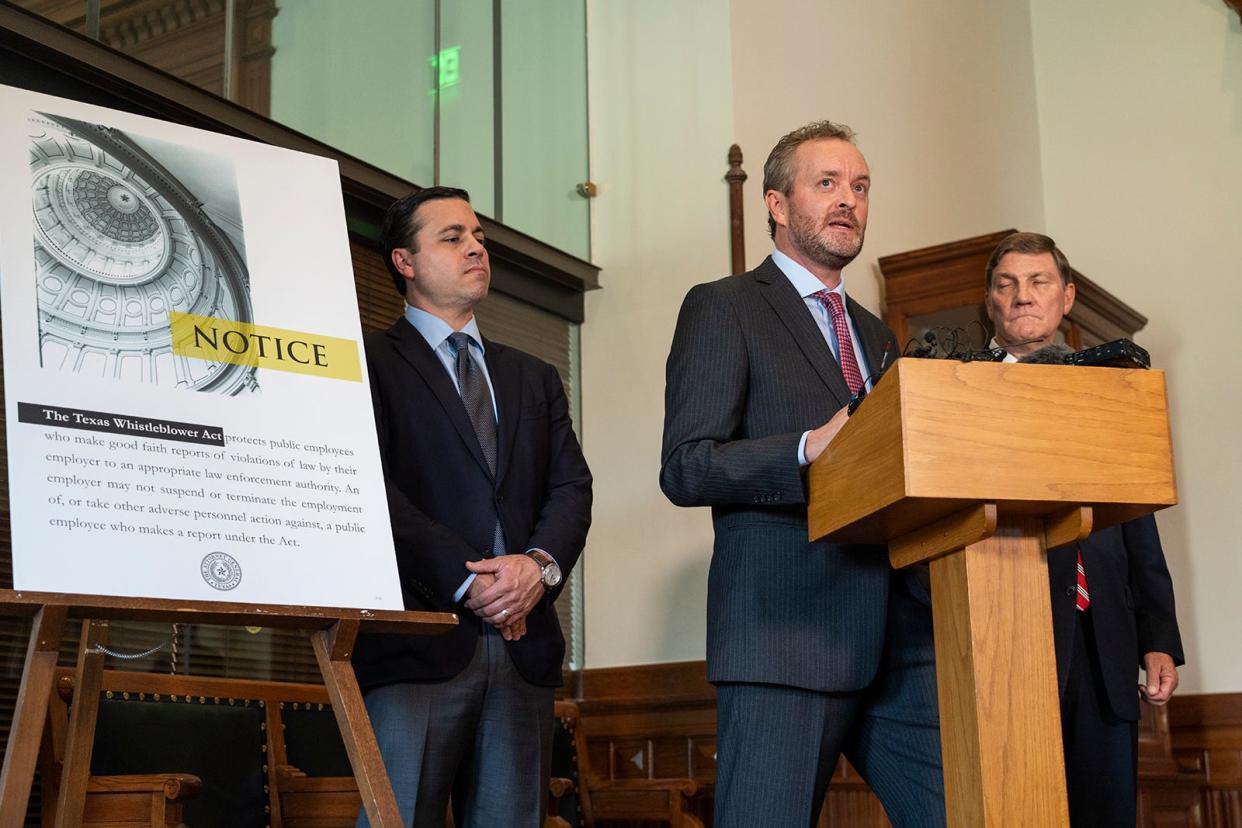 From left, Ryan Vassar, Blake Brickman and Mark Penley, all former senior-level employees of the Texas attorney general's office, speak at a Capitol news conference Monday.