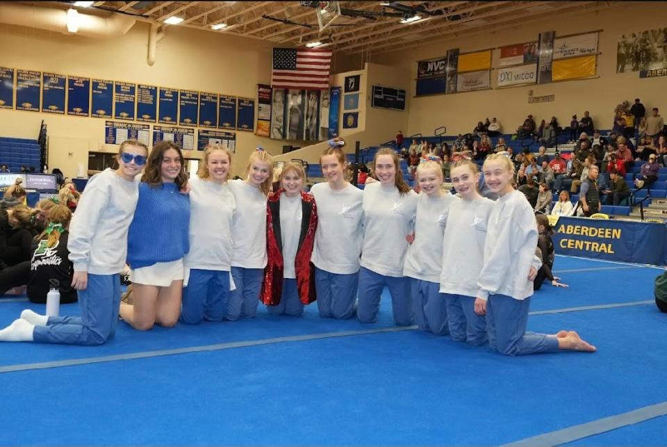 The Lincoln High School gymnastics team poses for a picture after a meet.