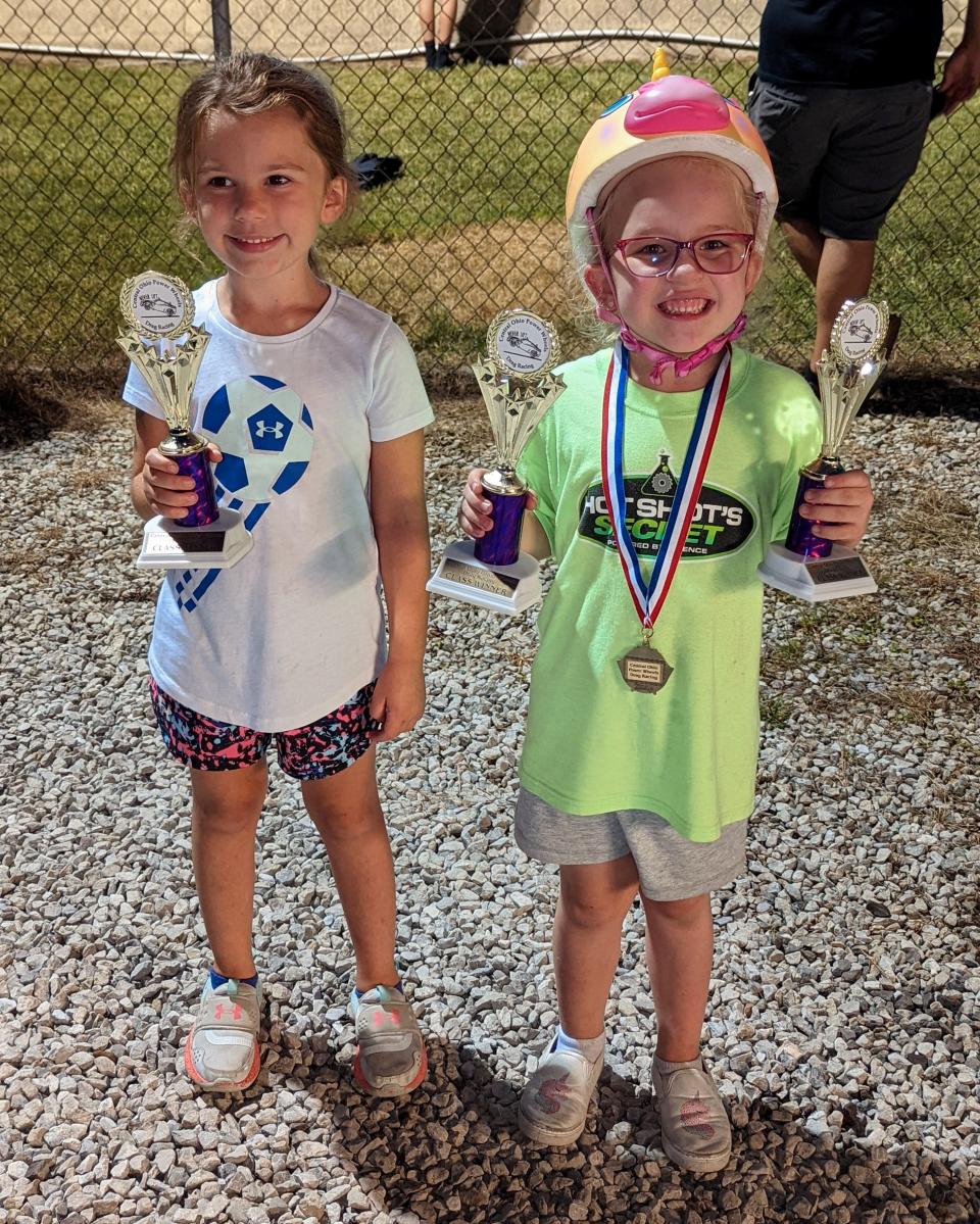 Adelle Robinson, right, recently won a pair of titles on the Central Ohio Power Wheels Tour.