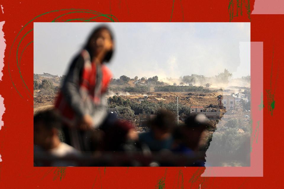 In the foreground, a blurry person on horseback with others walking under and in front of them, as smoke rises from trees amid fighting in the background.