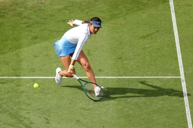 Emma Raducanu hits a backhand