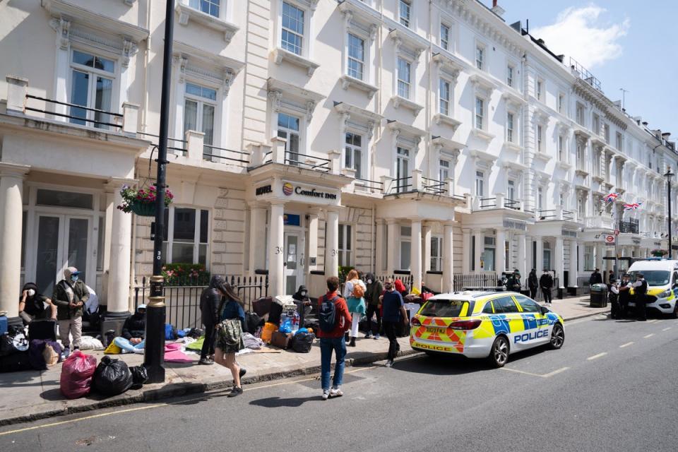 A view of the scene outside the Comfort Inn hotel on Belgrave Road in Pimlico, central London, where the Home Office have reportedly asked a group of refugees to be accommodated four to a room. (PA Wire)