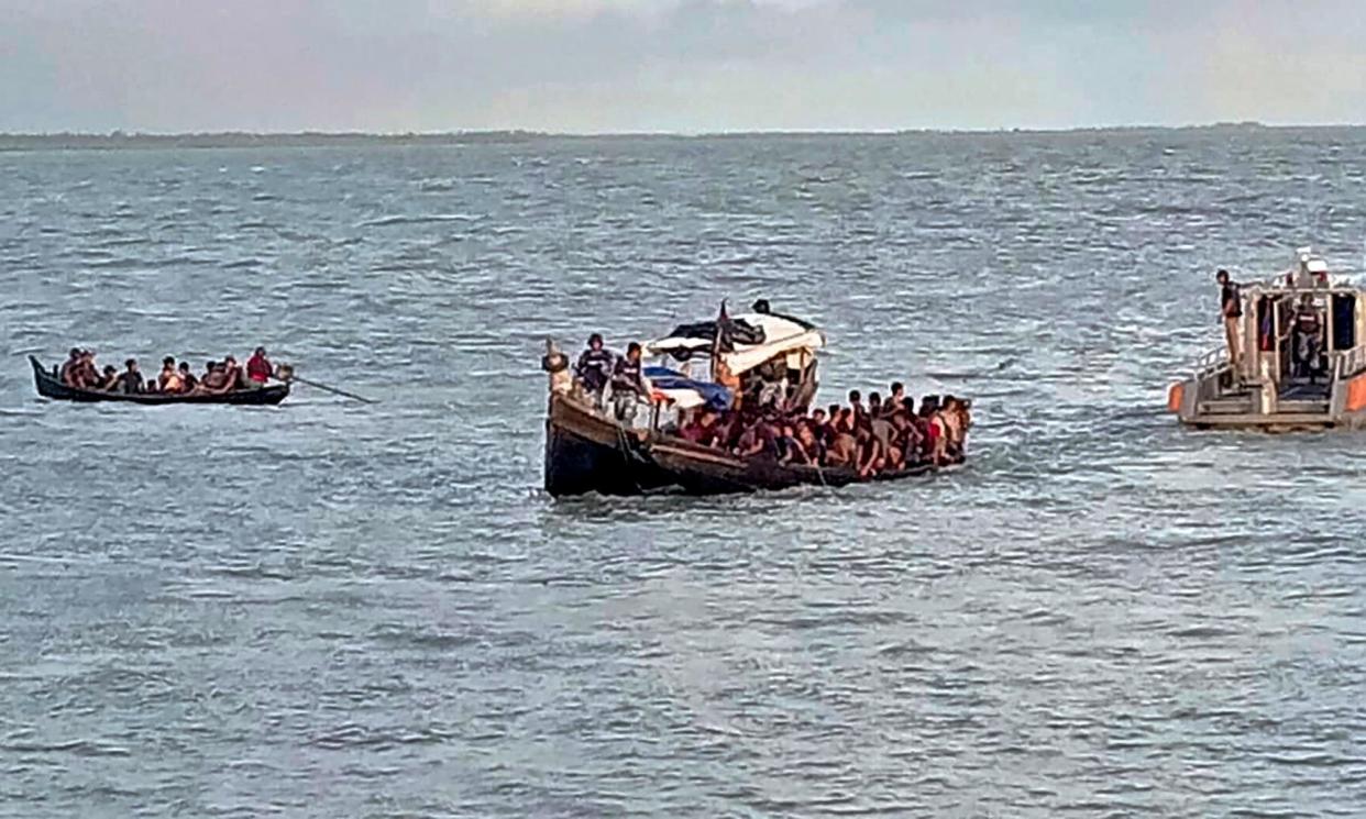 <span>Bangladesh military pursue Rohingya fleeing Myanmar on the Naf River border in July. A drone attack on villages on August 5 has increased the numbers fleeing the country.</span><span>Photograph: AFP/Getty</span>