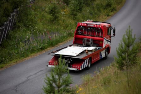 Parts of wreckage retrieved from the crash site are transported to the accident investigation team at Umea Airport