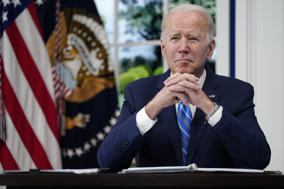 President Joe Biden participates in the White House COVID-19 Response Team's regular call with the National Governors Association in the South Court Auditorium in the Eisenhower Executive Office Building on the White House Campus, Monday, Dec. 27, 2021, in Washington. (AP Photo/Carolyn Kaster)