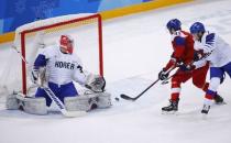 Ice Hockey – Pyeongchang 2018 Winter Olympics – Men Preliminary Round Match – Czech Republic v South Korea - Gangneung Hockey Centre, Gangneung, South Korea – February 15, 2018 - Jan Kovar of the Czech Republic scores past goalie Matt Dalton of South Korea during the first period. REUTERS/Brian Snyder