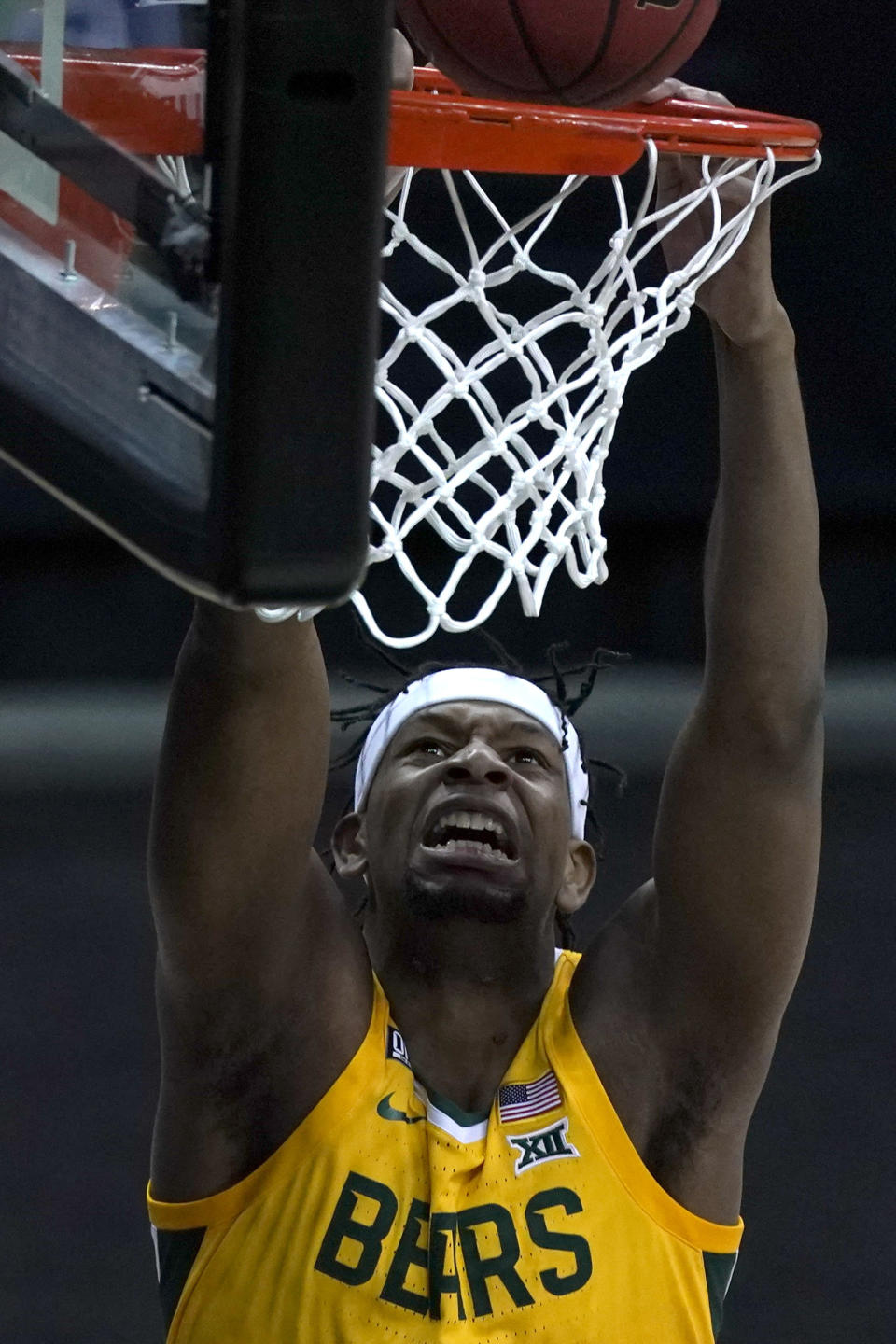 Baylor's Flo Thamba shoots against Oklahoma State during the first half of an NCAA college basketball game in the semifinals of the Big 12 tournament in Kansas City, Mo., Friday, March 12, 2021. (AP Photo/Charlie Riedel)