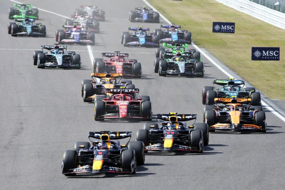 Red Bull driver Max Verstappen, left, of the Netherlands leads the field shortly after the start of the Japanese Formula One Grand Prix at the Suzuka Circuit in Suzuka, central Japan, Sunday, April 7, 2024. (AP Photo/Hiro Komae)