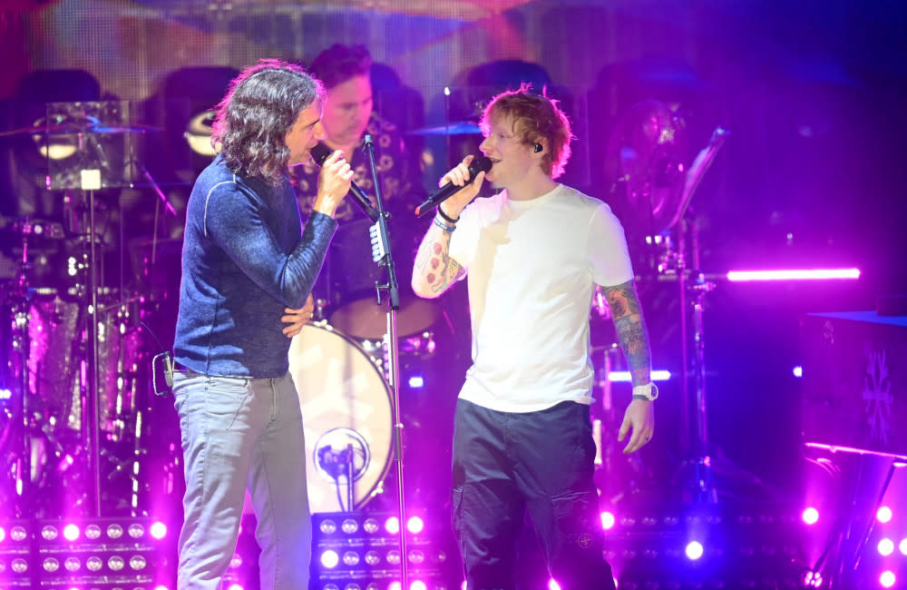 Ed Sheeran joined Snow Patrol on stage in a surprise appearance (c) Dave J. Hogan/Getty Images credit:Bang Showbiz