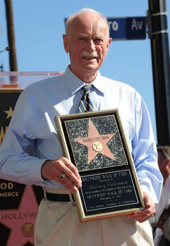 <p>Angela Weiss/Getty</p> Dabney Coleman with his Hollywood Walk of Fame star in 2014.