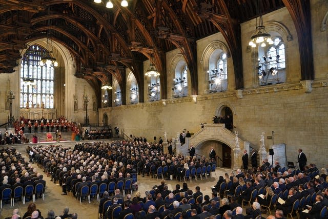 King Charles III and the Queen Consort at Westminster Hall, London, on Monday