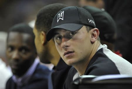 Oct 17, 2014; Cleveland, OH, USA; Cleveland Browns quarterback Johnny Manziel watches the Dallas Mavericks at Cleveland Cavaliers NBA game at Quicken Loans Arena. REUTERS/David Richard-USA TODAY Sports/File photo