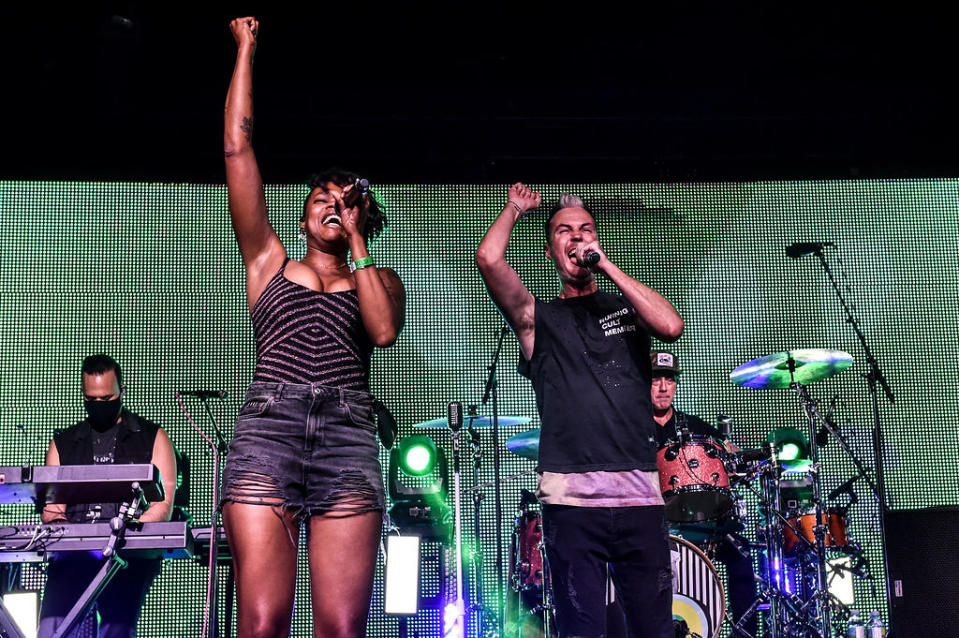 <p>Fitz and The Tantrums’ Noelle Scaggs and Michael Fitzpatrick take the stage during the band’s Drive-In OC Concert at The City National Grove of Anaheim on Saturday in California. </p>