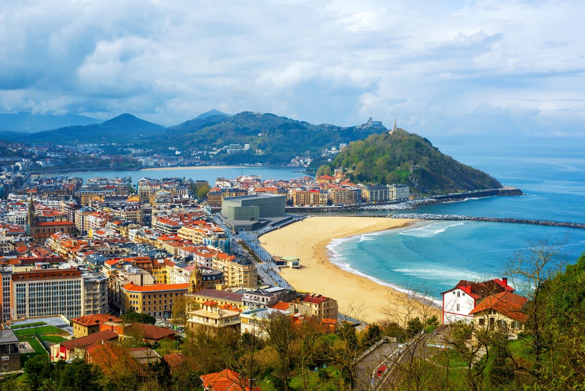 Golden sand and green hillsides border San Sebastian (Getty Images/iStockphoto)