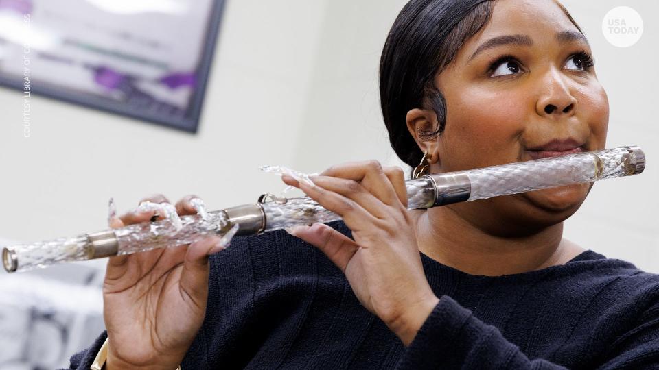 Lizzo plays President James Madison's flute at the Library of Congress on Sept. 26, 2022.