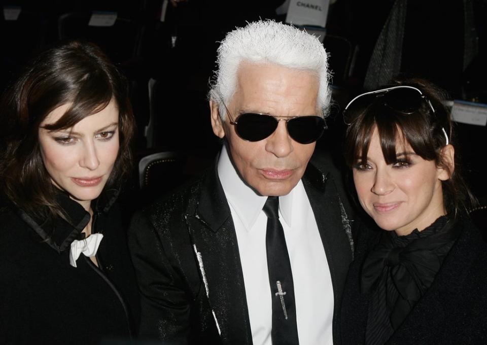 Cat Power (right) with Karl Lagerfeld and Anna Mouglalis at the Chanel Paris Monte Carlo fashion show, December 2006 (Getty)