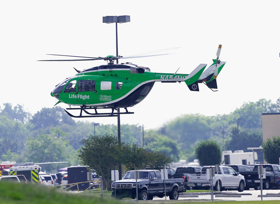 <p>A Life Flight helicopter takes off from Santa Fe High School where a shooting took place on May 18, 2018 in Santa Fe, Texas. (Photo: Bob Levey/Getty Images) </p>